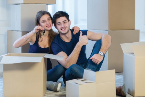 Professional house removalists in Stepney packing moving boxes