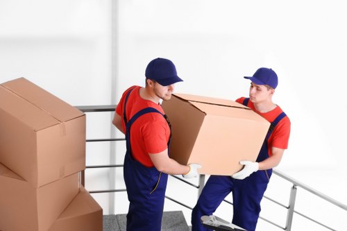 Removal team preparing equipment safely before a house move