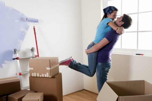 Planning flat removals in Stepney with packing boxes and checklist